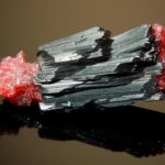 abelsonite-is-rare-precious-natural-geological-stone-gradient-background-low-key-isolate-header-banner-mockup-with-space-ai-generated_868611-1586